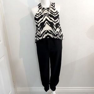 NWT LOVE...ADY ZEBRA PRINT TOP JUMPSUIT.